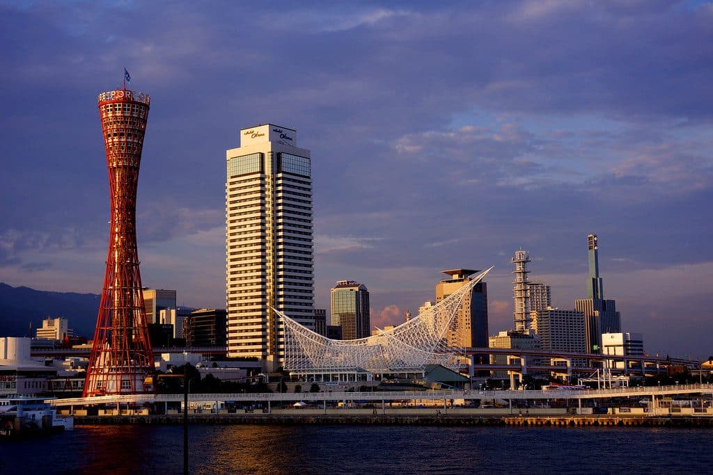 Kobe Port Tower and the Maritime Museum glowing at golden hour