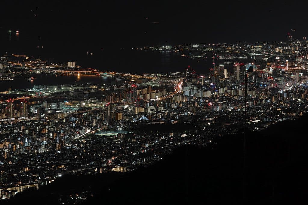 Kobe city lights stretching to the bay, seen from Mt. Rokko at night